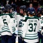Boston Fleet's Hilary Knight (21) celebrates the win with Megan Keller (5) during the third period of a PWHL hockey game against the Ottawa Charge in Ottawa, Ont., Saturday, March 15, 2025.