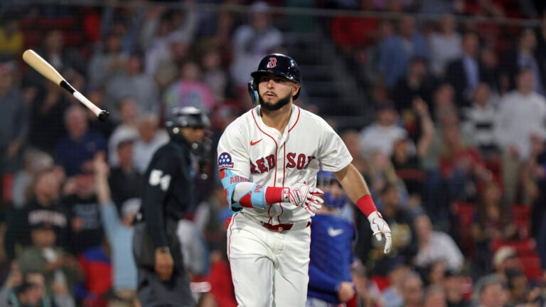 The Red Sox's Wilyer Abreu tosses his bat away after hitting a home run during the fourth inning.