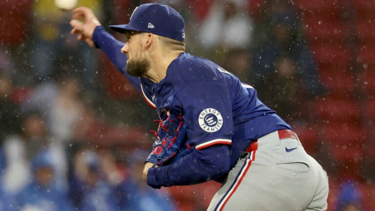 Texas Rangers pitcher Nathan Eovaldi throws during the first inning.