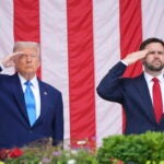 President Donald Trump and Vice President JD Vance salute during the 157th National Memorial Day Observance at Arlington National Cemetery, Monday, May 26, 2025, in Arlington, Va.