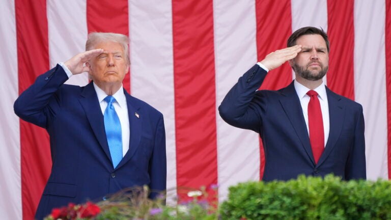 President Donald Trump and Vice President JD Vance salute during the 157th National Memorial Day Observance at Arlington National Cemetery, Monday, May 26, 2025, in Arlington, Va.