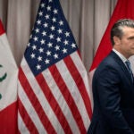 Secretary of Defense Pete Hegseth arrives for a meeting with Peru's Foreign Affairs Minister Elmer Schialer and Peru's Minister of Defense Walter Astudillo at the Pentagon, Monday, May 5, 2025, in Washington.