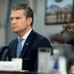 Secretary of Defense Pete Hegseth listens during a meeting with Peru's Foreign Affairs Minister Elmer Schialer and Peru's Minister of Defense Walter Astudillo at the Pentagon, Monday, May 5, 2025, in Washington.