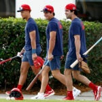 Boston Red Sox prospects Kristian Campbell, Roman Anthony and Marcelo Mayer walk onto the fields for first day of spring training at JetBlue Park.