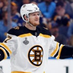 In this June 1, 2019, file photo, Boston Bruins defenseman Torey Krug celebrates a teammate's goal against the St. Louis Blues during the first period of Game 3 of the NHL hockey Stanley Cup Finals, in St. Louis. Smaller defensemen like the 5-foot-9 Krug have taken on more importance around the league in recent years for their mobility and puck-moving skills.