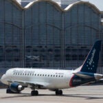A Republic Airways plane was towed from the runway at Logan Airport after experiencing an issue.