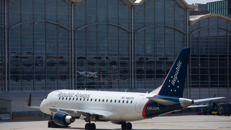 A Republic Airways plane was towed from the runway at Logan Airport after experiencing an issue.