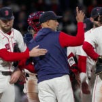 Boston Red Sox manager Alex Cora signals for a pitching change as he takes Boston Red Sox starting pitcher Garrett Crochet (35) out in the 6th inning. The Boston Red Sox host the New York Mets on Wednesday, May 21, 2025 at Fenway Park in Boston, MA.