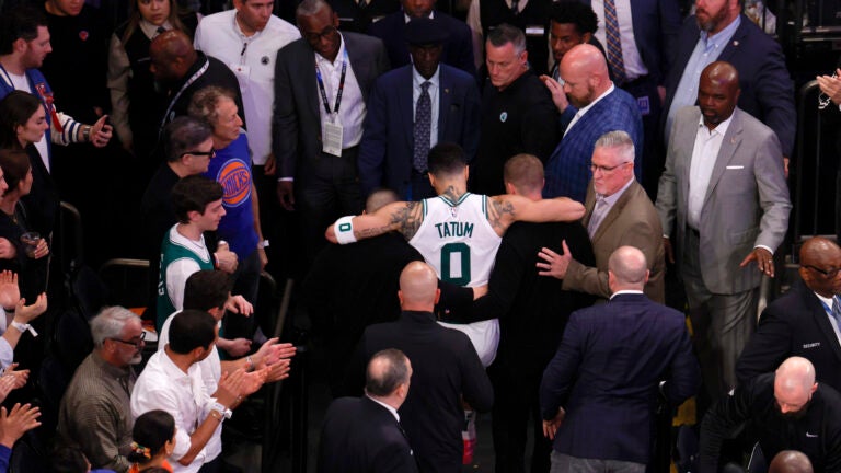 Boston Celtics forward Jayson Tatum (0) is carried off the court during the fourth quarter in game four of the NBA Eastern Conference semifinal against the New York Knicks at Madison Square Garden.