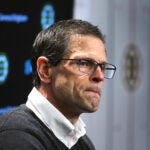 Boston-11/20/2024 The Boston Bruins held practice at Warrior Ice Arena under their new coach, Joe Sacco after Jim Montgomery was fired as the head coach. Don Sweeney pauses as he answers a question affter talking to the media after practice.