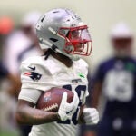 The Patriots held a mini rookie camp at the Gillette Stadium bubble. Kyle Williams runs with the ball during a drill.
