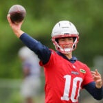 The NE Patriots held offseason workouts at the Gillette Stadium practice field. QB Drake Maye Fires a pass.