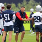 The NE Patriots held offseason workouts at the Gillette Stadium practice field. Coach Mike Vrabel gives blocking instructions to players. John Tlumacki/Boston Globe Staff