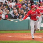 Los Angeles Angels designated hitter Mike Trout watches his home run during the first inning of a baseball game against the Boston Red Sox, Monday, June 2, 2025, in Boston.