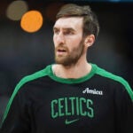 Boston Celtics center Luke Kornet looks on in the first half of an NBA basketball game, Jan. 7, 2025, in Denver.