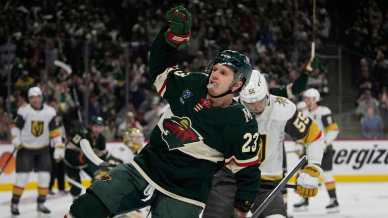 Minnesota Wild center Marco Rossi (23) celebrates after scoring during the first period of Game 3 of a first-round NHL hockey playoff series against the Vegas Golden Knights, Thursday, April 24, 2025, in St. Paul, Minn.