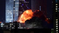 Iran unleashes scores of ballistic missiles on Israel