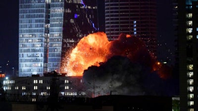 Iran unleashes scores of ballistic missiles on Israel