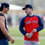 Alex Bregman, right, and Jarren Duran laugh during Bregman’s first workout since being signed with the Boston Red Sox during spring training at JetBlue Park.