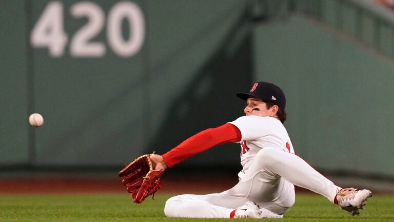 Red Sox outfielder Roman Anthony makes a sliding catch on a fly out by Tampa Bay's Jonathan Aranda during the sixth inning.