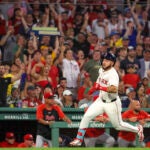 Wilyer Abreu of the Red Sox rounds third base during his inside-the-park home run against the Cincinnati Reds during fifth inning.