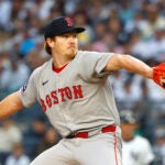 Boston Red Sox pitcher Hunter Dobbins (73) throws against the New York Yankees during the first inning of a baseball game, Sunday, June 8, 2025, in New York.