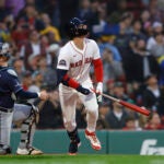 Red Sox outfielder Roman Anthony hits a pop fly in his first at bat during the second inning at Fenway Park on June 9, 2025.