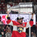 Florida Panthers center Brad Marchand skates with the Stanley Cup after defeating the Edmonton Oilers in Game 6 of the NHL hockey Stanley Cup Final Tuesday, June 17, 2025, in Sunrise, Fla.