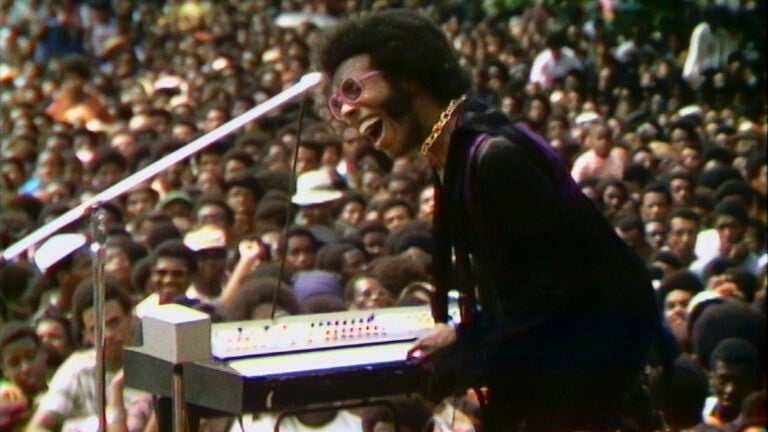 This image released by Searchlight Pictures shows Sly Stone performing at the Harlem Cultural Festival in 1969, featured in the documentary "Summer of Soul."