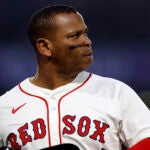 Boston Red Sox designated hitter Rafael Devers (11) walks off the field after a ground out during the third inning at Fenway Park on June 9, 2025.