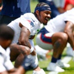 Foxborough, MA- 6/2/25- New England Patriots wide receiver Stefon Diggs participates in team stretches during the OTA offseason workouts at Gillette Stadium on June 2, 2025.