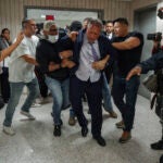 New York City Comptroller Brad Lander is placed under arrest by Immigration and Customs Enforcement and FBI agents outside federal immigration court on Tuesday, June 17, 2025, in New York.