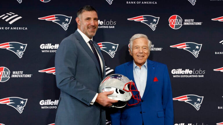 New England Patriots CEO Robert Kraft, right, poses with new head coach Mike Vrabel after the introductory press conference at Gillette Stadium.