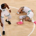 New York, NY - 5/12/25- Boston Celtics forward Jayson Tatum (0) lays on the floor in pain as Boston Celtics guard Jaylen Brown (7) looks on during the fourth quarter in game four of the NBA Eastern Conference semifinal against the New York Knicks at Madison Square Garden.