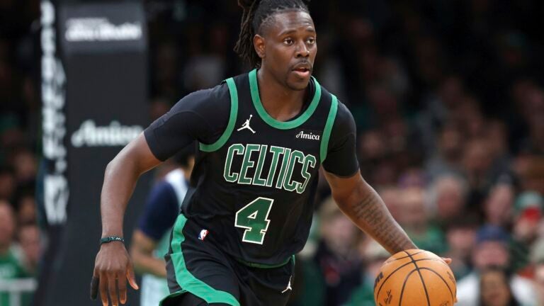 Boston Celtics' Jrue Holiday plays against the Washington Wizards during the first half of an NBA basketball game on April 6, 2025, in Boston.