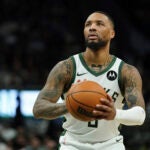 Milwaukee Bucks' Damian Lillard shoots a free throw during the second half of an NBA basketball game against the Orlando Magic, March 8, 2025, in Milwaukee.