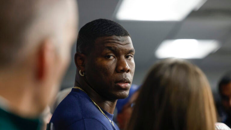 New England Patriots defensive end Keion White speaks to reporters before practice at Gillette Stadium.