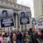 A crowd gathers in Foley Square, outside the Manhattan federal court.