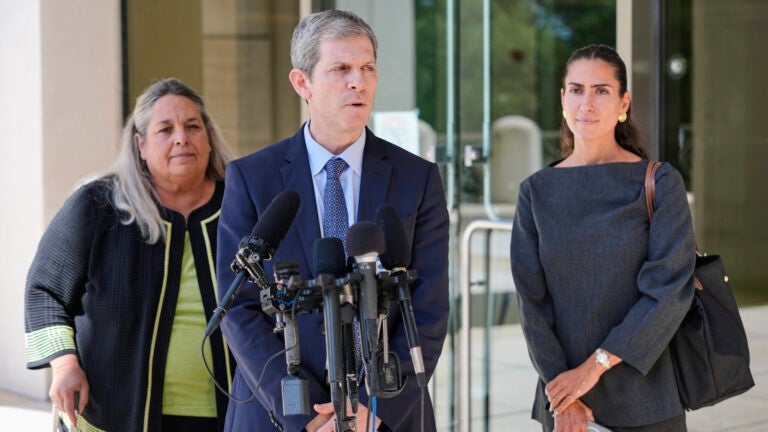 David Oscar Markus, attorney for Ghislaine Maxwell, center, speaks during a news conference outside the federal courthouse in Tallahassee, Fla., Thursday, July 24, 2025. Behind him is Leah Saffian, co-attorney, left, and Mellissa Madrigal, right.