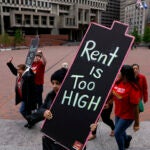 Over 100 people march for affordable housing and rent control at Boston City Hall on May 20, 2025.
