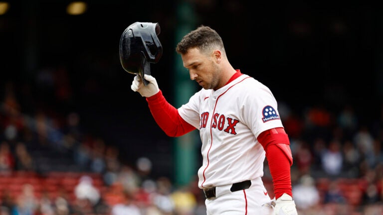 Boston Red Sox's Alex Bregman heads for the dugout after injuring himself on a single against the Baltimore Orioles during the fifth inning in the first baseball game of a doubleheader Friday, May 23, 2025, at Fenway Park in Boston.