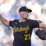 Pittsburgh Pirates starting pitcher Mitch Keller throws during the first inning of a baseball game against the Kansas City Royals, Tuesday, July 8, 2025, in Kansas City, Mo.