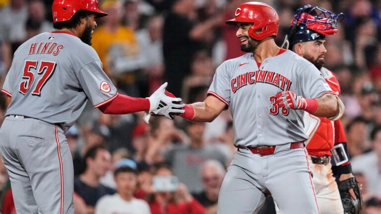 Reds’ rally to beat Red Sox 8-4