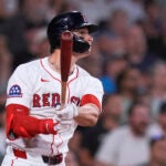 Red Sox -- Roman Anthony of the Red Sox watches the flight of his two-run home run against the Colorado Rockies during the fifth inning.