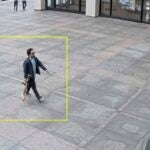 This image from surveillance video obtained by The Associated Press shows Shane Tamura outside a Manhattan office building on Monday, July 28, 2025 in New York.