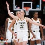 Caitlin Clark -- Indiana Fever's Caitlin Clark gestures to the crowd during the first half of a WNBA basketball game against the Connecticut Sun Tuesday, July 15, 2025, in Boston.