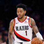Portland Trail Blazers guard Anfernee Simons dribbles during the second half of an NBA basketball game against the Oklahoma City Thunder, Friday, March 7, 2025, in Oklahoma City.