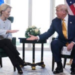 President Donald Trump and European Commission President Ursula von der Leyen shake hands after reaching a trade deal at the Trump Turnberry golf course in Turnberry, Scotland Sunday, July 27, 2025.