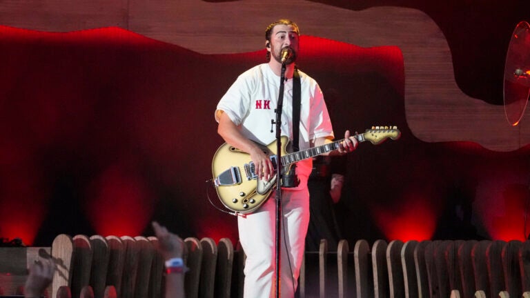 Noah Kahan performs during his “We’ll All Be Here Forever Tour” at Fenway Park in Boston on July 18, 2024.