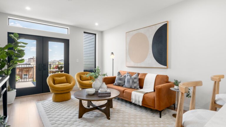 The large deck is accessible from the living room.